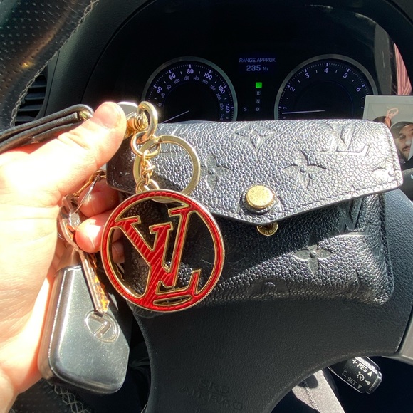 Louis Vuitton wristlet with leather wristlet and Louis Vuitton Keychain - Picture 9 of 11
